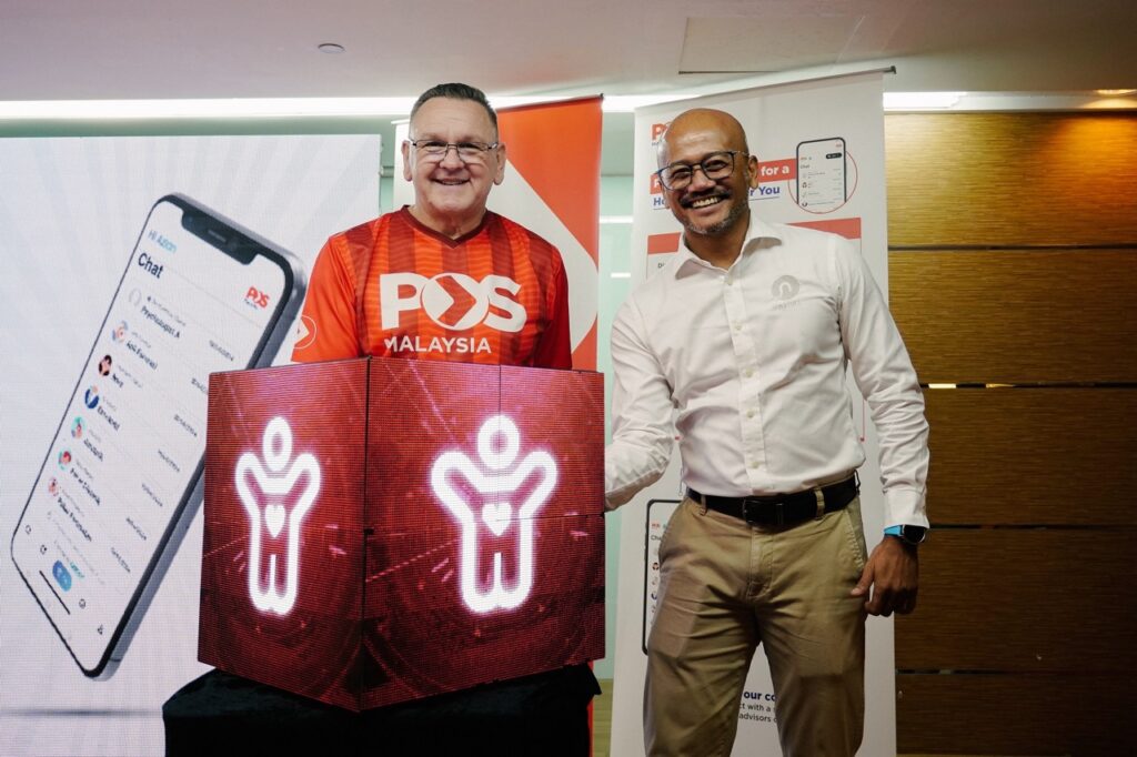 Charles Brewer Group CEO of Pos Malaysia (left) with Azman Osman -Rani CEO of Naluri Large